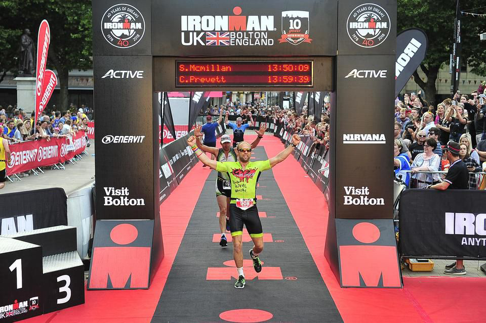 Steven McMillan Crossing the Iron Man Finish Line